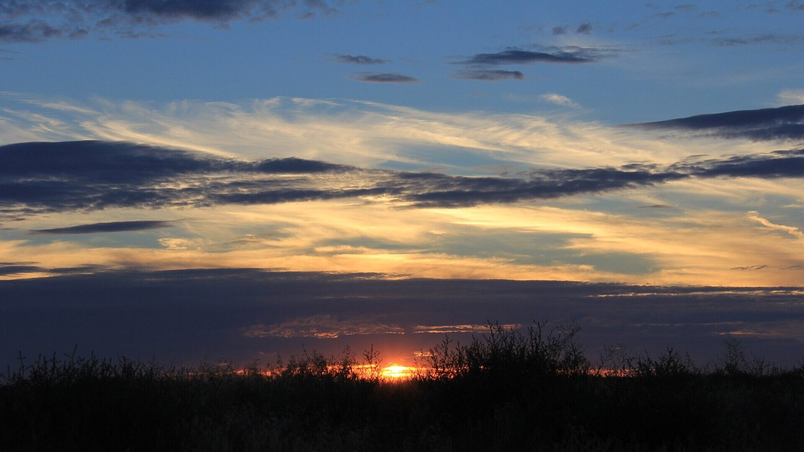 Sunset over open landscape
